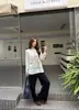 Camiseta estampada de manga larga con protección solar estilo coreano para mujer, nueva llegada otoño 2026, blusa top floral casual ajustada