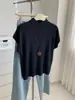 Top de punto elegante de seda helada con cuello alto y manga corta para mujer, Otoño temprano 2026, Camisa base versátil casual de corte ajustado