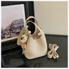 Bolso tote elegante y sofisticado para mujer, nueva colección 2026, bolso cruzado casual, bolso de mano de nicho para mujer, bolso tipo cubo