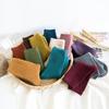 Calcetines para niños al por mayor calcetines de otoño e invierno para niños modernos engrosados cálidos de medio terciopelo calcetines para bebés serie de colores sólidos calcetines para niños y niñas
