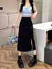 Falda midi dividida para mujer Diseño Primavera 2024 Cintura alta adelgazante falda de un solo paso moda estilo coreano falda de cadera