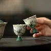Taza de té de cerámica para té con orquídea pintada a mano de estilo antiguo, con pie alto y boca de flor para beber té