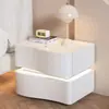 Mesa de noche de lujo ligero estilo crema de alta gama 2025 nueva celebridad de internet creativa para dormitorio hogar simple moderna mesa de noche