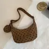 Bolso de hombro de lunares estilo coreano para mujer, nuevo modelo 2026, bolso cruzado casual y relajado para el día a día, bolso de axila de alta apariencia para estudiantes