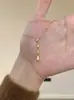 Collar de cadena fina para mujer con colgante de gota de agua cepillada de alta gama, simple, personalizado, moderno, versátil, apilable, elegante cadena para la clavícula, gargantilla, a la moda