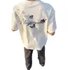 Bordado Floral Unissex Verão Manga Curta Solto Roupa de Casal Meia Manga Camisa Streetwear Masculino Bordado Novo Estilo 2026