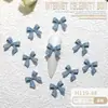 Ins Celebridad de Internet popular resina joyería para uñas al por mayor cinta de color lazo diy corbata de lazo tridimensional accesorios para uñas