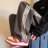 Calça de Veludo Tendência Estilo Americano para Homens, Temporada de Primavera, Calça de Moletom Solta de Perna Reta para Adolescentes, Calça Longa Esportiva Casual Versátil