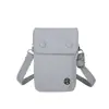 Bolsa Pequeña de Tela de Nylon Simple de Nicho de Verano para Mujer 2025 Nueva Moda Casual Bolso Cruzado Bolso para Teléfono Móvil