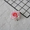 Flor artificial cabeza de flor de rosa y esquina Caja de regalo de rosa Relleno de arreglo floral con pared de flores manualidades de decoración material floral flor de seda al por mayor