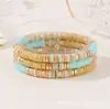 Set de pulseras de arcilla suave coloridas apilables de 6 mm elástico color Morandi bloques de color bohemio pieza metálica