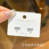 Aretes de mini corazón con zirconita incrustada de una flecha atravesando el corazón aretes de temperamento fresco y simple aretes pequeños y exquisitos aretes de plata