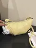 Bolso de Diseño de Nicho Minimalista de Color Sólido con Forma de Cuerno para Mujer 2026 Nuevo Versátil de Moda para Viaje Diario Bolso de Hombro Cruzado