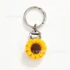 Suministra y Vende Clips de Sombrero de Viaje de Resina de Colores Simulados de Girasol 3D, Clips para Gafas de Sol y Accesorios para Bolsos de Mujer