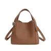 Versão Coreana Bolsa de Balde Portátil de Nicho para Mulheres Inverno 2025 Nova Moda Tendência Bolsa de Ombro Único Transversal