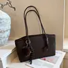 Bolsa Feminina Estampa de Leopardo Vintage 2026 Nova Tendência de Outono Nicho Luxo Leve Alto Padrão Bolsa de Ombro Sob o Braço