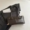 Bolso de axila de diseño nicho estilo coreano, retro y sofisticado, versátil con cinturón de remaches, gran capacidad, adecuado para ir al trabajo, bolso de hombro tipo tote