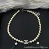 Collar Cruzado Chanel Doble C Nueva Colección, Auténtico con Etiquetas, Alta Calidad, Venta al por Mayor con Descuentos por Cantidad, Directo del Fabricante