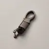 Directo de fábrica llavero de cuerda tejida accesorios de ferretería hebilla de herradura colgante para llave de coche accesorios de coche de moda