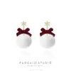 Pendientes de Bola de Pelo con Lazo Flocado Rojo de Año Nuevo Pendientes de Nicho de Gama Alta Pendientes de Nicho de Gama Alta para Boda de Año Nuevo