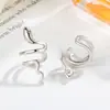 Pendientes de clip para orejas con forma de serpiente para niñas sin perforaciones, pendientes de diseño de nicho para otoño e invierno, accesorios para orejas de diseño minimalista estilo europeo y americano de comercio exterior