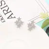 Joyas Transfronterizas Artículos Más Vendidos Exclusivamente para Ventas Transfronterizas: Aretes de Cobre con Circonia en Forma de Estrella, Aretes Súper Brillantes Micro-Incrustados, Suministro Multicanal