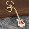 Accesorios para Guitarra Eléctrica Mini Simulación Transfronteriza Colgante de Instrumento Musical Colgante para Bolsa de Regalo de Evento Llavero de Guitarra de Metal con Goteo de Aceite