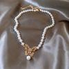 Collar de mariposa con colgante de mariposa, circonitas, perlas y diamantes, estilo nicho, combina con todo, cadena de clavícula ligera y de lujo, joyería de alta gama.