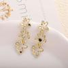 Brincos de Flor Oca de Diamante Estilo Coreano High-end Light Luxury Niche Brincos 925 Brincos Brincos Longos de Borla Feminina