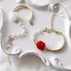 Pulsera de Perlas Rosas Estilo Francés Nueva al por Mayor, Joyería de Mariposa Versátil con Diseño de Nicho Vintage para Mujer
