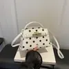 A bolsa de bolinhas popular deste ano para mulheres, nova bolsa transversal versátil da moda 2026, bolsa de mão requintada, bolsa quadrada pequena