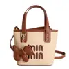 Bolso de mano casual versátil y elegante 2026, bolso de nicho de alta gama para salir, bolso de hombro y cruzado, bolso pequeño