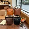 Bolsa de mão grande estilo vintage com toque de luxo, novo modelo de moda de nicho para o dia a dia, bolsa transversal de ombro único para mulheres