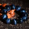 Pulsera de piedra ojo de tigre azul natural en oferta Pulsera de piedra ojo de tigre azul con patrón de rayo de los fabricantes de gemas de cristal Ketang de Guangdong