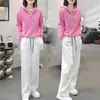 Traje casual fashion para mulheres, novo estilo primavera 2026, conjunto de duas peças moderno com moletom com capuz soltinho emagrecedor e calça pantalona