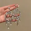 Brincos leves de luxo elegantes com gotas d'água vazadas, brincos de diamante estilo asiático Simi para mulheres, vestido de noiva, brincos de borla exagerados