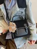 Mochila Frosted Retro Transfronteriza para Mujer Casual Diseño de Nicho Bolso Escolar Estudiante Moderno Multifuncional Cruzado Bolso Cuadrado Pequeño