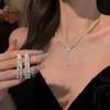Conjunto de dos piezas de collar y pendientes de moda para novias transfronterizas con adornos de diamantes en forma de gota de agua, cadena para mujer, luz súper brillante, lujo al por mayor