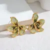 Pendientes de botón de flor de pétalo de acero inoxidable de colores Lujo Ligero Retro Sensación de Alta Gama Pendientes Florales Sencillos Aceite Gotas Adornos Transfronterizos