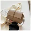 Bolso nuevo de comercio exterior para mujer, simple y elegante, con patrón de lichi, adecuado para ir al trabajo, tiene un tacto de alta gama, es de nicho y versátil, se puede llevar al hombro o cruzado, adecuado para comercio transfronterizo