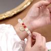 Nuevo estilo chino popular pulsera de cuentas femenina nicho retro alto sentido pareja novias todo partido pulsera de perlas joyería