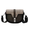 Bolsa de nicho estilo francês feminina 2024 outono e inverno nova bolsa de ombro estilo ocidental de alta qualidade bolsa de sela de bloco de cores de PU