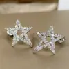 Pendientes asimétricos de cinco puntas de lujo elegante, pendientes creativos de estrella con circonita brillante
