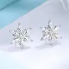 Accesorios Populares Transfronterizos Pendientes de Copo de Nieve Estilo Moda Coreana para Mujer Pendientes Frescos con un Toque de Lujo Ligero y de Alta Gama Joyería al por Mayor