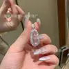 Venta al por mayor de fábrica pequeño rojo departamento natural agua espuma frijol azul colgante plata S925 incrustado pequeño fresco diseño de moda mujeres