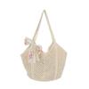 Bolso tote tejido hueco pequeño fresco de estilo literario caliente de primavera y verano de este año, bolso de hombro de gran capacidad estilo vacacional de ocio