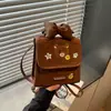 Mochila retro de oso lindo estilo coreano para niñas, nueva y elegante, para uso diario y viajes, mochila pequeña de peluche