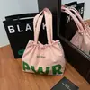 Bolsa de Ombro Feminina de Verão 2025 Casual de Grande Capacidade Bolsa Tote Casual de Lona de Nylon Bolsa para Estudante