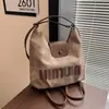 Mochila para Mujer 2025 Nuevo Otoño Popular Bolso Tote para Viajar Diseño de Nicho Versátil Estilo Extranjero Mochila de Gama Alta