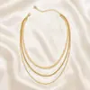 Collar de clavícula hueca apilada versátil de joyería transfronteriza europea y americana, collar de cadena de hueso de serpiente de metal retro personalizado de múltiples capas